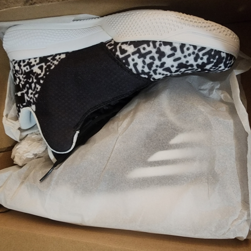 Adidas Black and White Sneakers with Unique Pattern